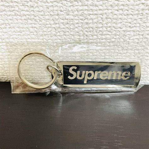 supreme14ss unhs metal tag box logo black polished keychain|The most in.